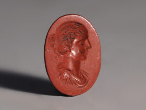 ancient roman jasper intaglio with a portrait of a woman