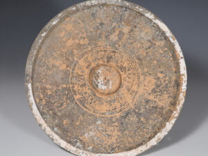 ancient greek libation bowl with omphalos