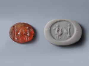ancient roman carnelian intaglio of cupid with cockerels