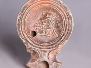 ancient roman terracotta oil lamp of silenus