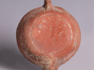 ancient roman terracotta oil lamp with faces 2