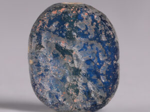 babylonian blue glass stamp seal combat scene