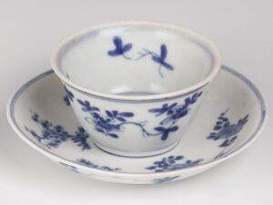 blue-and-white-saucer-and-cup-set-with-floral-decoration