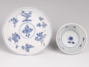 blue-and-white-saucer-and-cup-set-with-floral-decoration