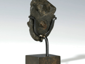 bronze image of woman and dog