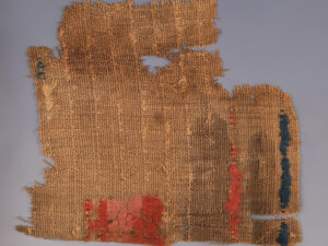 coptic textile fragment with colourful wool accents