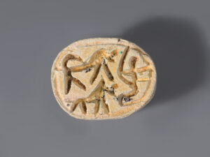 egyptian steatite scarab with hunting scene