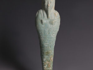 egyptian faience shabti with hieroglyphic inscriptions