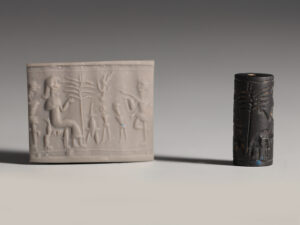 mesopotamian stone cylinder seal with a banquet scene