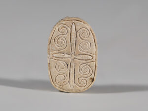 ancient egyptian scarab with geometric design