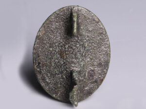 green-glass-bossed-plate-bronze-brooch