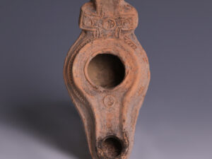 holy land terracotta oil lamp with cross handle.