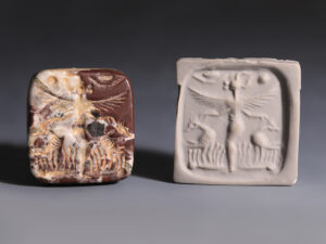 large neo assyrian agate stamp seal winged anthropomorphic figure ostriches