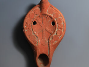 roman terracotta oil lamp with chi rho monogram
