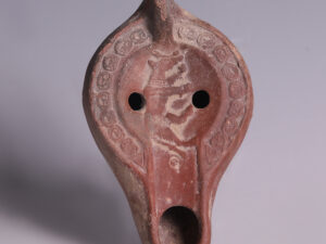 roman north african oil lamp with dog