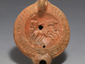 Roman Terracotta Oil Lamp with Apollo Riding a Chariot Pulled By Griffins