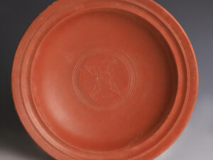 roman redware bowl with incised leaf decoration