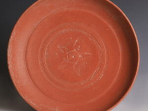 roman redware bowl with leaf design