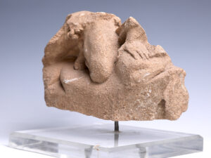 tarentine limestone relief fragment of a crouching man