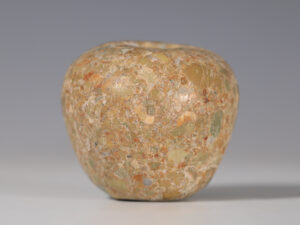 western asiatic polychromatic limestone macehead