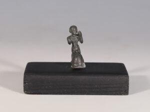 ancient egyptian bronze figurine of a kneeling priest
