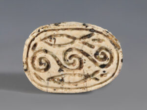 egyptian steatite scarab with decorative fish