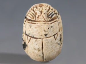 egyptian steatite scarab with decorative fish