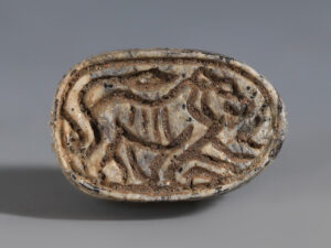 egyptian hardstone scarab with a lion