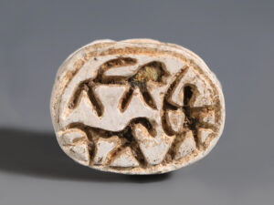 egyptian steatite scarab with hunting scene