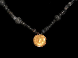 ancient roman black glass beaded necklace with gold pendant. 2