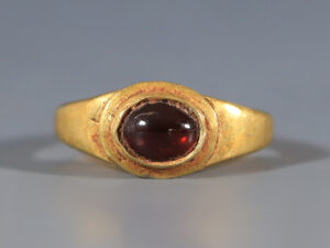 ancient roman gold ring with garnet inset