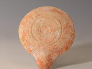 ancient roman terracotta oil lamp with fisherman
