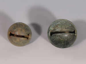 pair of post-medieval crotal bells with founder’s initials