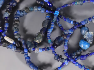 selection of ancient roman dark blue glass beaded bracelets