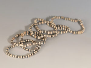 selection of sumerian stone beaded bracelets