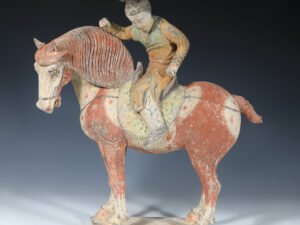 tang dynasty terracotta polo player with horse statuette