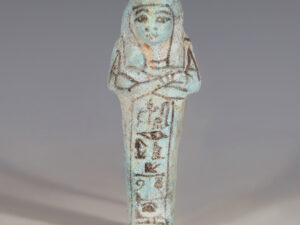 ancient egyptian blue faience shabti with hieroglyphic inscription